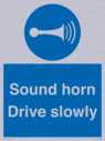 sound-horn-drive-slowly-warehousing-and-delivery-sign~